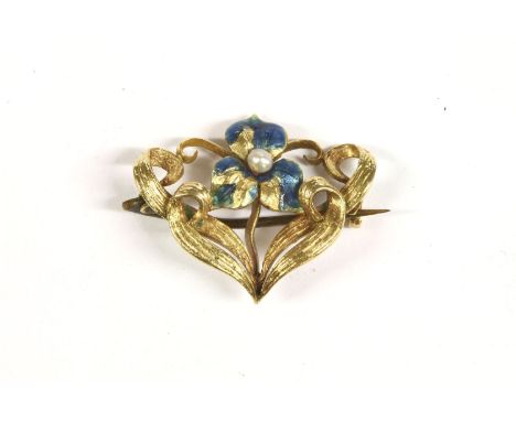 An Art Nouveau seed pearl blue enamel Iris brooch, with scrolling leaves, tested as approximately 15ct, pearl untested, 4.24g