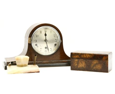 An oak cased mantel clock, together with two similar examples, an onyx desk stand, an oil lamp (Qty.)
