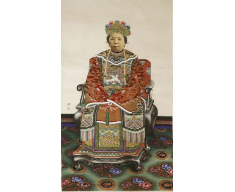 A Chinese hanging scroll,20th century, a portrait of an elderly woman in winter court robes,seated in an armchair, two seals 