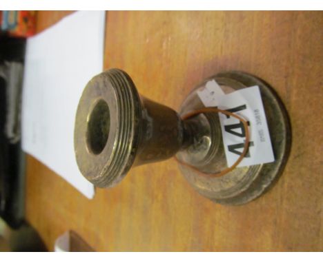 A squat silver candlestick