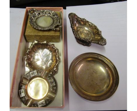 A silver caddy spoon, two silver dishes, silver bowl and two other silver items