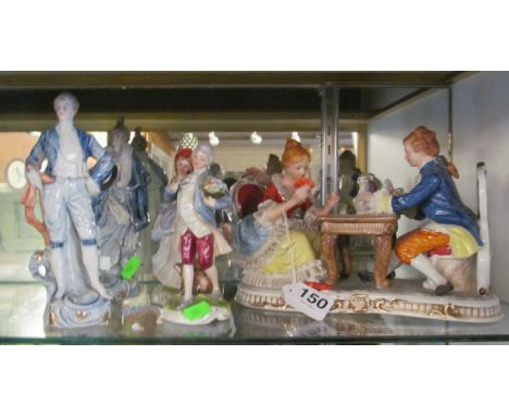 A china figure group gallant and lady playing cards and two pairs of other figures