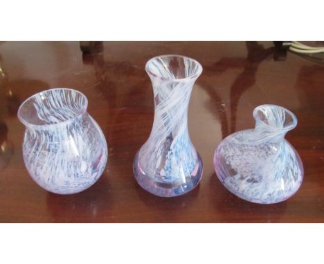 A Caithness paperweight and other coloured glass