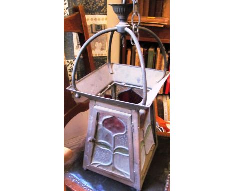 A stained glass ceiling lantern with hinged door