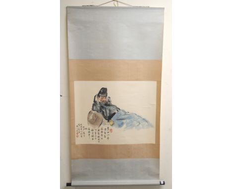 A CHINESE SCROLL PAINTING depicting a man at rest, signed and red seal marks, image size, 61 x 77cm, the scroll 97cm wide Con