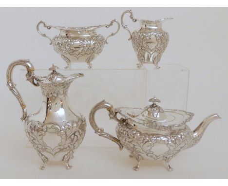 A LATE VICTORIAN FOUR PIECE SILVER TEA SERVICE possibly by John Alexander Fettes, Glasgow 1899, of rounded oval form, the bod