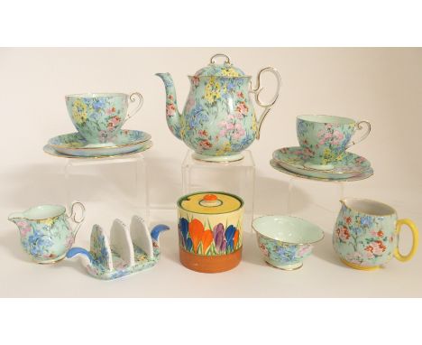 A SHELLEY MELODY BREAKFAST SET comprising two trios, teapot, milk jug, sugar bowl and toastrack, together with another jug an