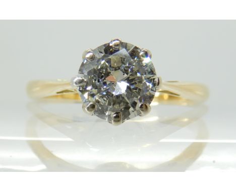 AN 18CT GOLD AND PLATINUM DIAMOND SOLITAIRE of estimated approx 0.88cts, in classic crown mount, finger size O, weight 2.6gms