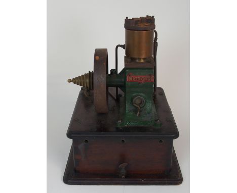 A VINTAGE METROGAS ENGINE with brass presentation plaque inscribed Presented With The Compliments of South Metropolitan Gas C