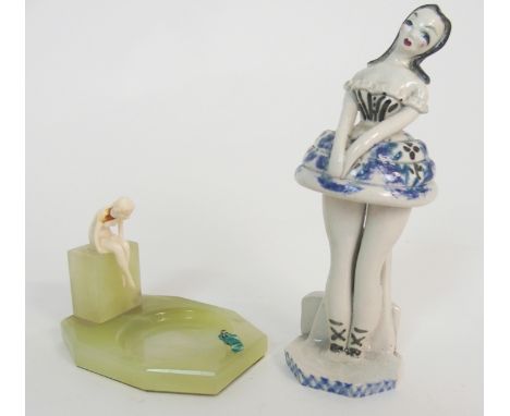 A IVORY MOUNTED ONYX TRINKET DISH mounted with a naked female sitting on a plinth, with a green frog wearing a crown on the o