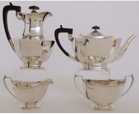 A FOUR PIECE SILVER TEA SERVICE by Z. Barraclough &amp; Sons Limited, Sheffield 1936, of shaped rectangular form with canted 