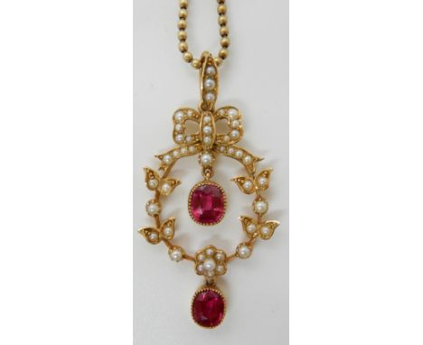 A 15CT GOLD FAUX RUBY AND PEARL EDWARDIAN PENDANT dimensions 4.6cm x 2.3cm, with a 9ct gold ball chain, length 40cm, weight 9