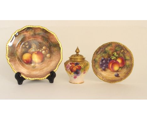 A ROYAL WORCESTER FRUIT DECORATED CABINET PLATE painted with grapes and apples on a mossy ground, 19.5cm diameter, a smaller 