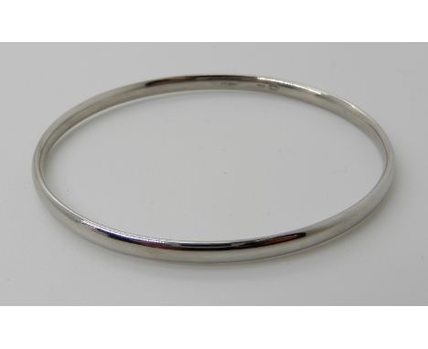 A GEORG JENSEN 18CT WHITE GOLD BANGLE inner dimensions 60mm x 52mm, width 3.7mm, weight 17.1gms Condition Report: Overall; ve