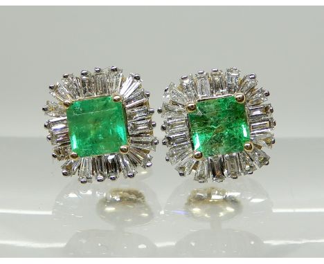 A PAIR OF 18CT GOLD DIAMOND AND EMERALD EARRINGS set with estimated approx 0.80cts of baguette cut diamonds, the emeralds are