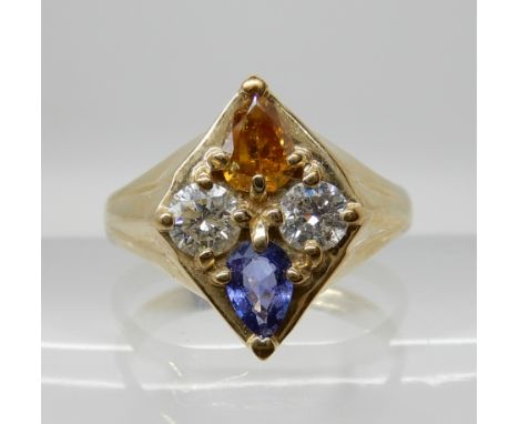 A 9CT GOLD YELLOW AND WHITE DIAMOND, AND SAPPHIRE RING the pear shaped yellow diamond is estimated approx 0.40cts with two fu