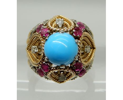 A BRIGHT YELLOW METAL GEM SET DOME RING set with rubies diamonds and a faux turquoise, finger size M1/2, weight 9.7gms Condit