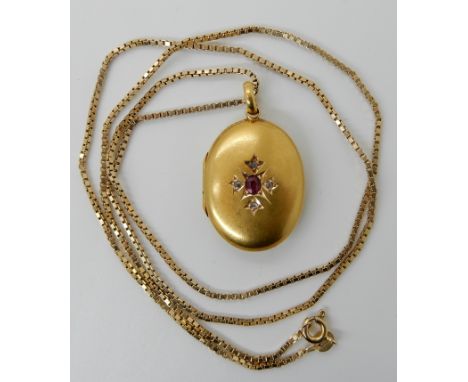 A 15CT GOLD RUBY AND ROSE CUT DIAMOND LOCKET locket stamped 15ct 625 Chester 1908, makers mark M&amp;G, stamped 15ct also to 