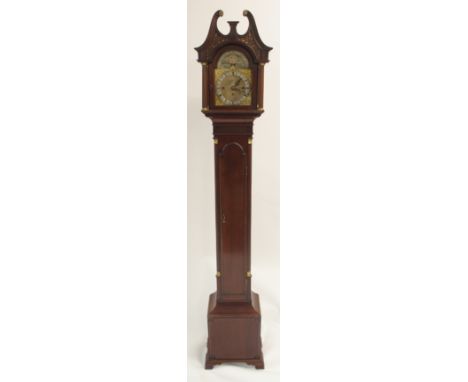 AN EDWARDIAN MAHOGANY LONGCASE CLOCK in the Georgian manner, the brass face with moon phase above North and South hemispheres