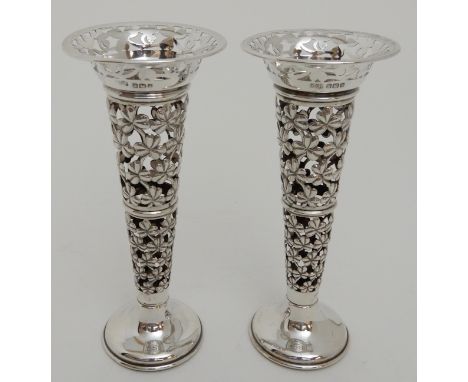 A PAIR OF SILVER VASES by R. F. Mosley &amp; Company (Robert Fead Mosley), Sheffield 1910, of trumpet shape with pieced folia