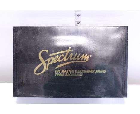 A sealed Bachmann Spectrum 11410 HO gauge Baldwin 2-8-0 consolidation and tender steam locomotive 