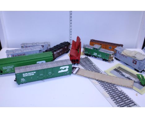 A selection of O gauge wagons and accessories 