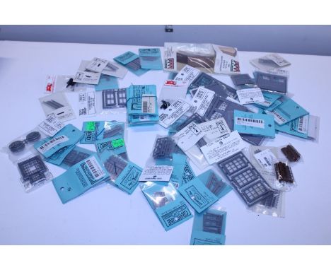 A box of new O gauge model railway accessories 
