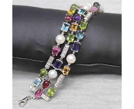 Armband HIGHLIGHT 18 Karat Weißgold, Brillanten und Farbedelsteine, nach Bulgari (Nicht original);68,6g, &nbsp;Die Maße des M