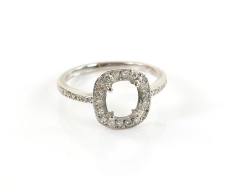 Diamond ring mount, set with Swiss cut diamonds, in white metal stamped 18 ct, ring size K.  CONDITIONcentral stone missing 1