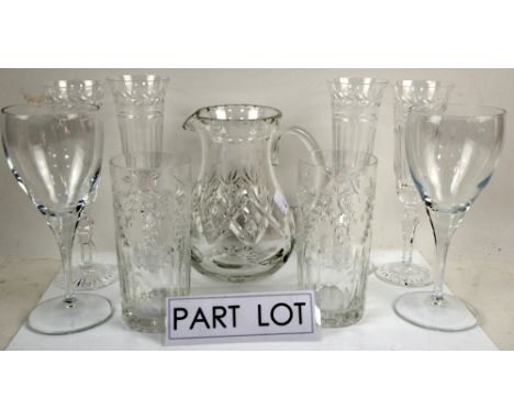 Four William Yeoward glasses, eight Stuart champagne glasses, four wine glasses and a cut glass jug .  