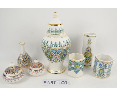 Quantity of middle eastern china with hand painted and gilded decoration, to include egg cups, trinket boxes, lidded urn, flu