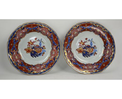 A pair of Spode Stone China plates, early 19th century, printed in blue and painted in iron red and gilt with an Imari patter