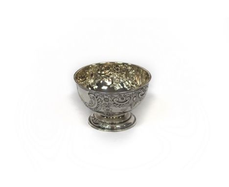 An Edwardian silver rose bowl, John &amp; William Deakin, Sheffield 1902, of circular form and embossed flowers and scrolls, 