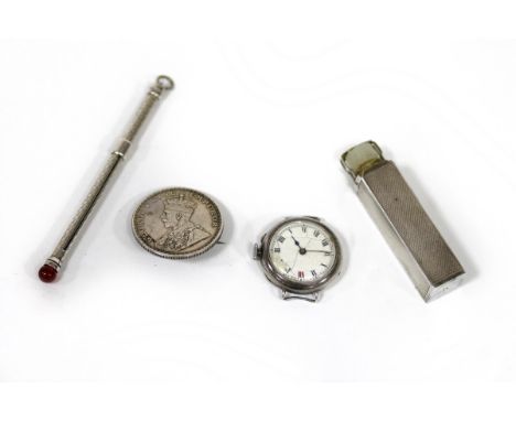 A silver scent bottle case with engine turned decoration, a silver swizzle stick, a coin brooch and a silver wristwatch