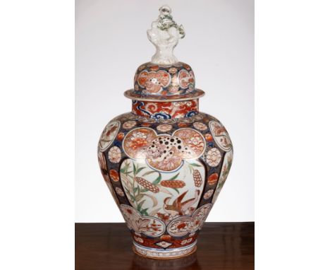 A Japanese Imari jar and cover, circa 1700, the cover with lion dog finial, 63cm high CONDITION REPORT: Cover restored from s