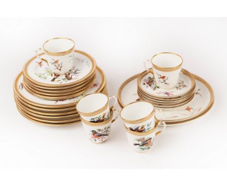 A Royal Worcester ornithological tea service comprising six cups, six saucers and two cake plates with beaded borders and a s