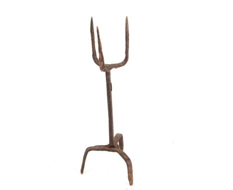 A wrought iron pricket candlestick, probably Spanish 18th Century, 36cm high 