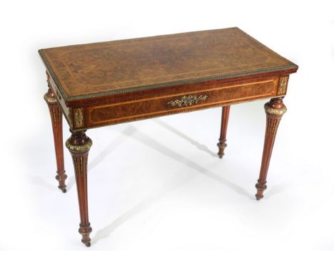 A Victorian burr walnut and gilt metal mounted card table, attributed to Holland & Sons, the fold over top with blue baize li