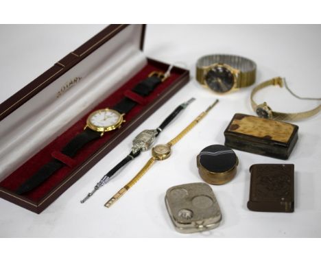 A gentleman's Rotary wristwatch, a lady's Rotary wristwatch, three other wristwatches, a Bakelite vesta case, a horn snuff bo