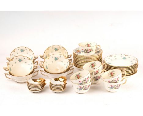 Eight Royal Crown Derby two-handled soup bowls and stands, seven Minton teacups and ten saucers and a collection of Royal Wor