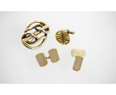 A pair of 9ct yellow gold cufflinks, with engine turned decoration, approximately 4.4gm, a 14k cufflink approximately 4.2gm a