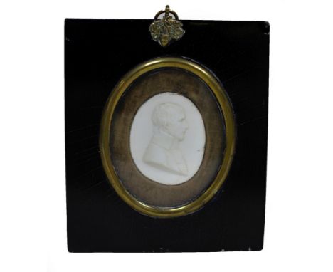 An oval cameo portrait of Nelson in ebonised frame, 5.5cm x 4.5cm