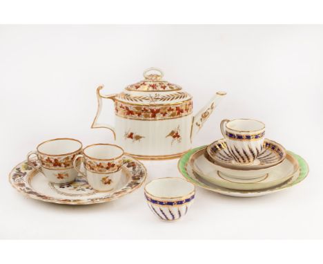 A group of Derby teawares, circa 1770, comprising a fluted teapot and cover, two coffee cups and a saucer, a trio, a saucer d