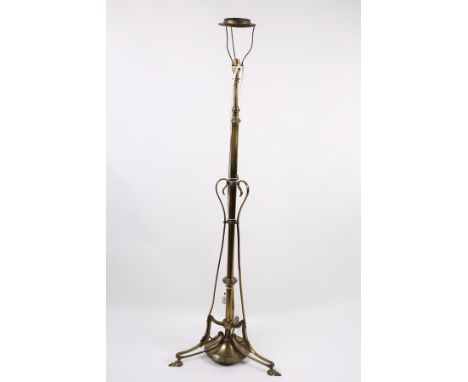 An Edwardian brass telescopic standard lamp with scroll support, 150cm high