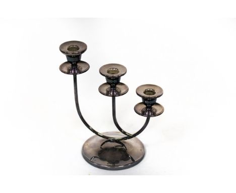 A modern silver three-branch candlestick, Birmingham 2000, on a circular foot, weighted, 23cm high