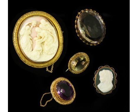 A Victorian shell cameo oval brooch depicting a religious scene, in a yellow metal frame, 6.5cm x 5.5cm, an oval smoky quartz