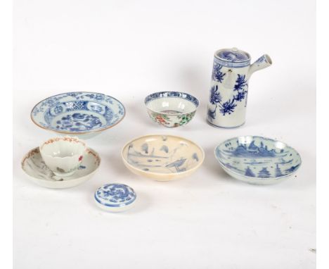 A Chinese famille verte tea bowl, 18th Century, decorated flowers in enamels and in underglaze blue, 10cm diameter, a late 18