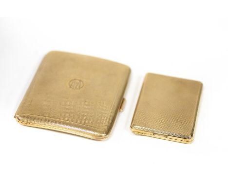 A 9ct gold cigarette case with presentation inscription and date and a 9ct gold vesta case with engine turned decoration, app