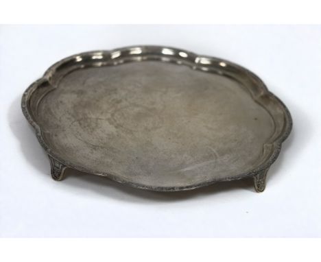 An Edwardian silver salver, Elkington &amp; Co., Birmingham 1938, with Celtic decoration to the rim, 35cm wide, approximately