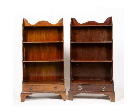 TWO SIMILAR REGENCY STYLE MAHOGANY WATERFALL BOOKCASES with single drawers and standing on bracket feet, one 61cm wide x 112c